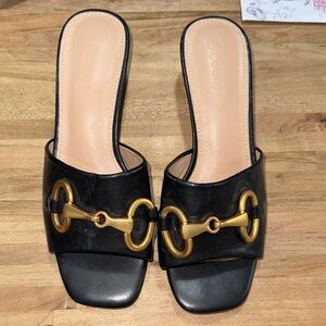 Coutgo black leather heels size 7